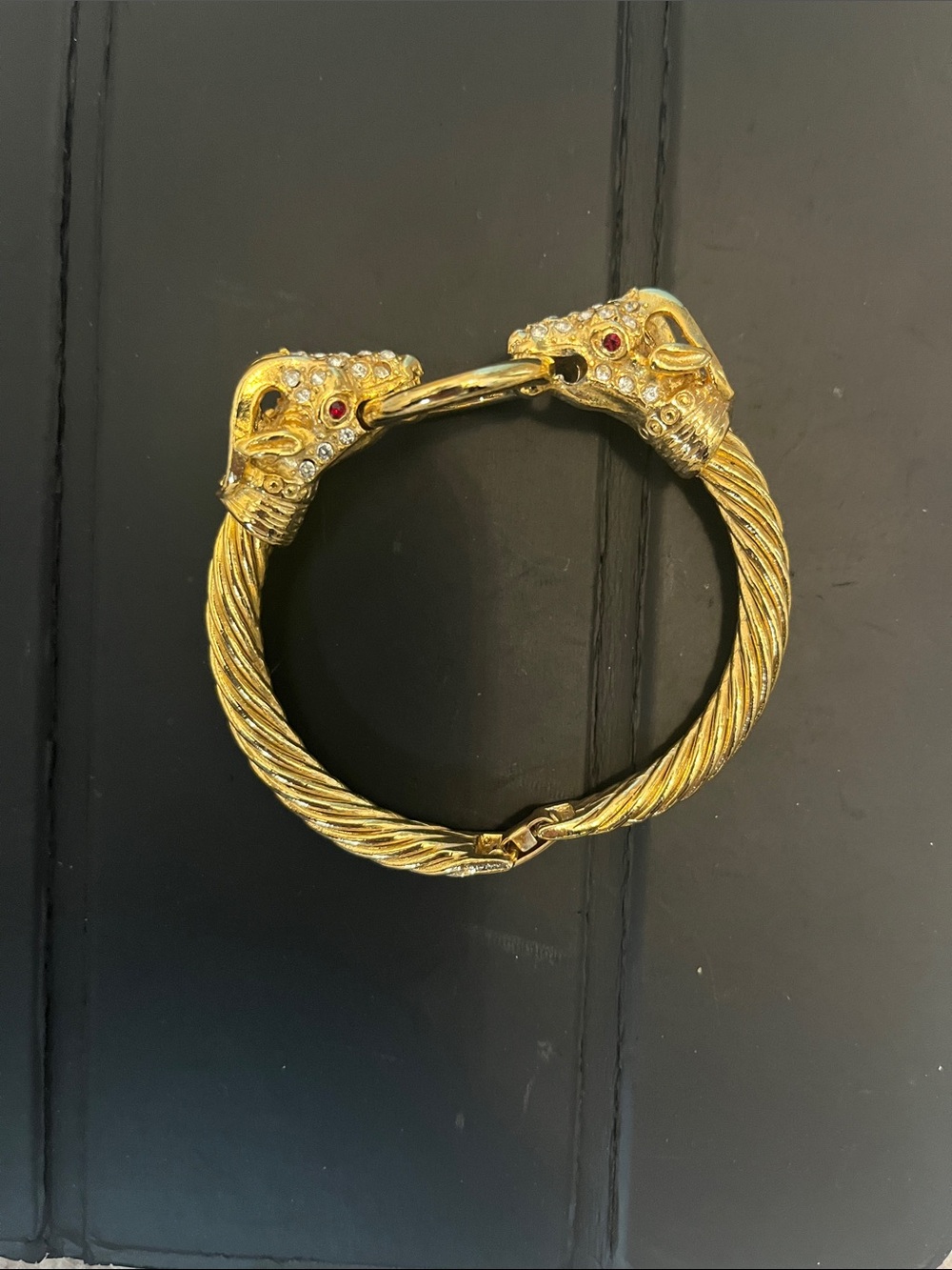 Gold Hinged Bracelet with Red Stone Eyes